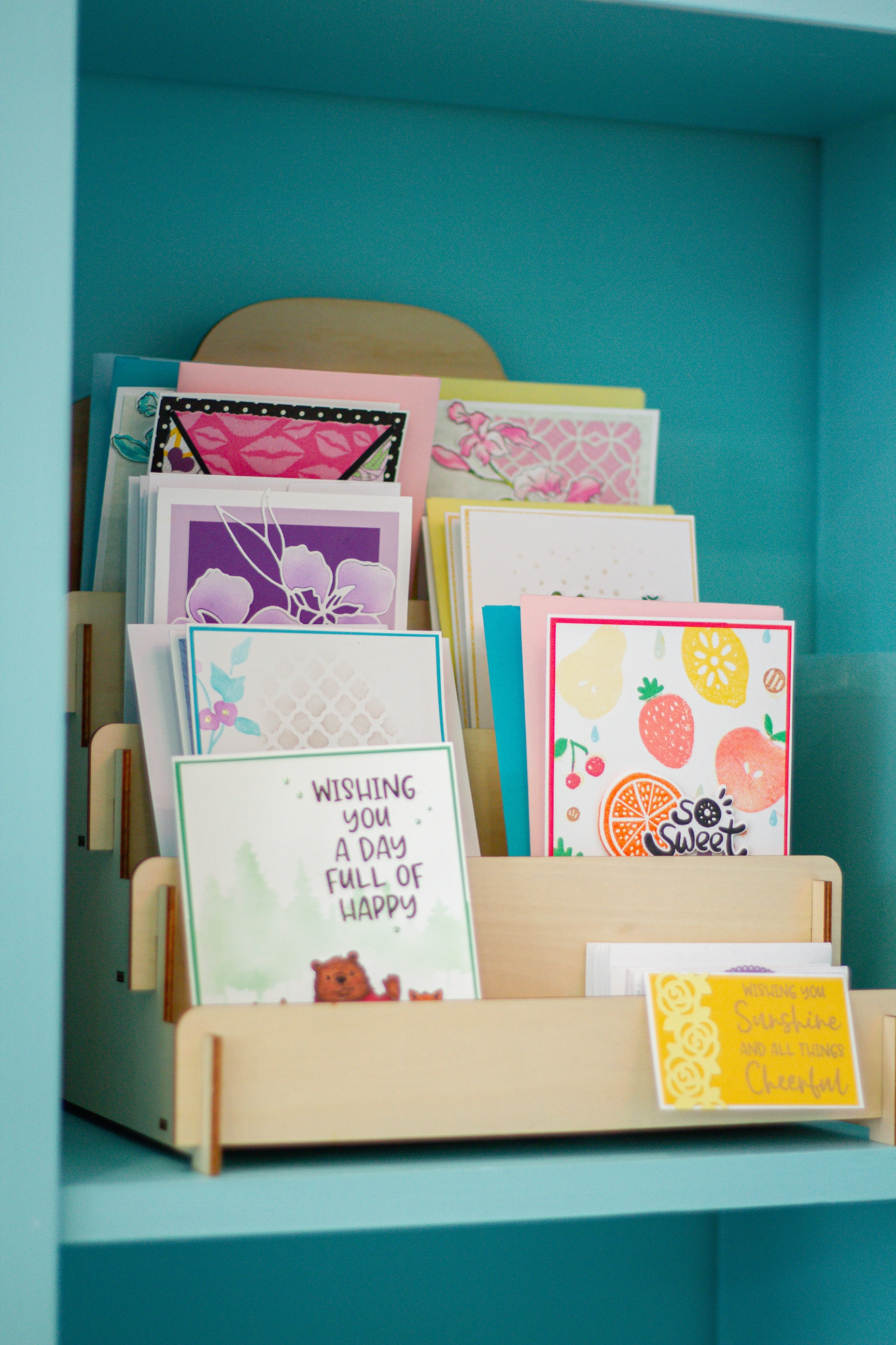 a display holing artisinal greeting cards